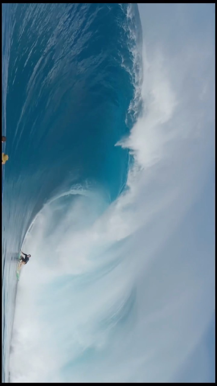 Brad Domke dropping into a wave at Jaws