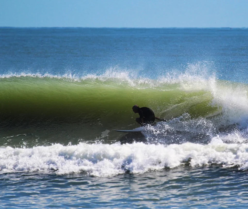 Chris Burdine surfing inside a breaking wave
