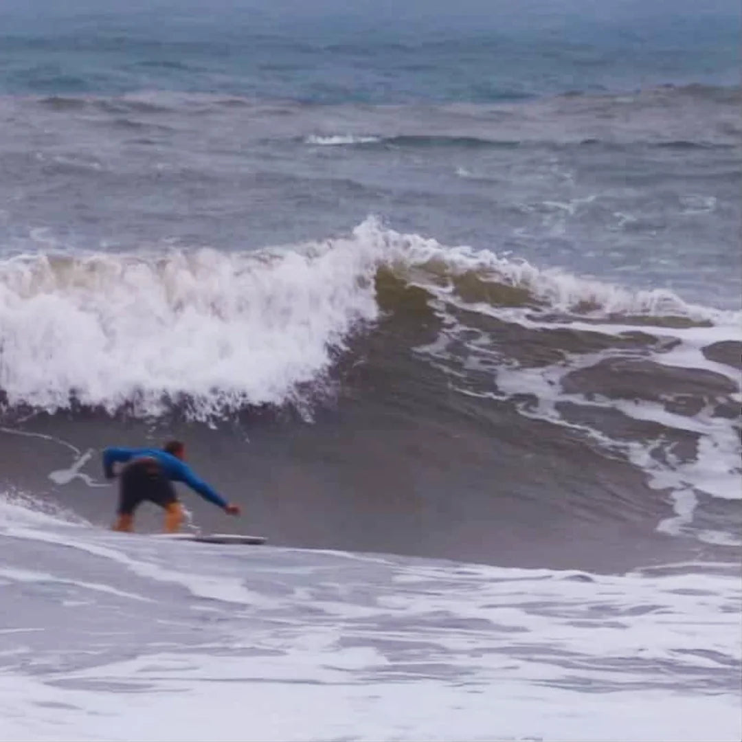 Christopher Duff setting his line on a breaking wave